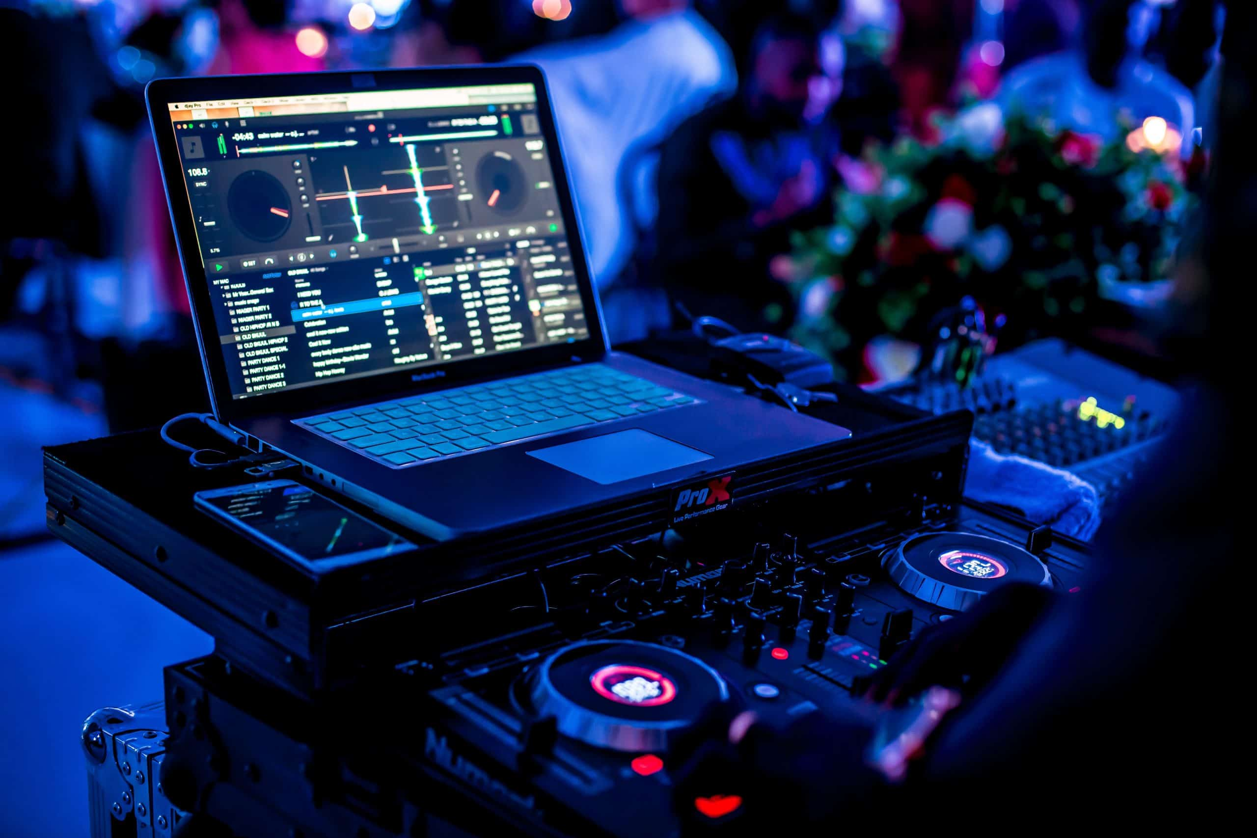 DJ setup with laptop and decks